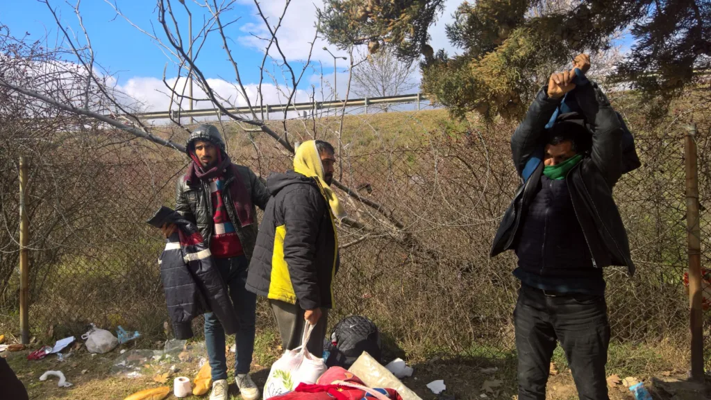 Group of migrants preparing to leave the camp