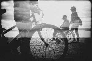 A double exposure photograph in front of Ohrid Lake, showcasing the merging of two distinct images.